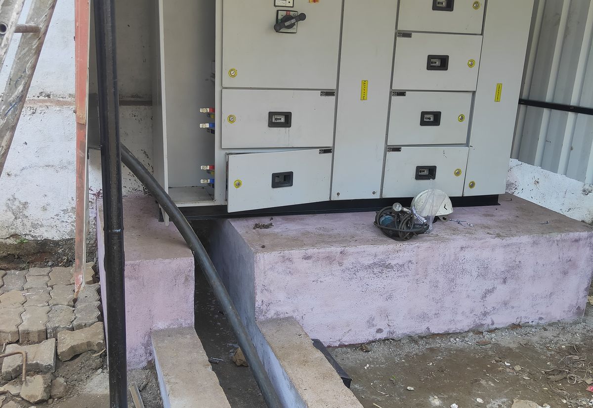 LT panel installed on a plinth at site and being commissioned